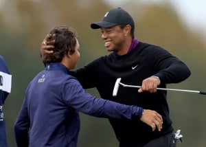 Tiger Woods hugging his son Charlie Woods at the PNC Championship 2023.