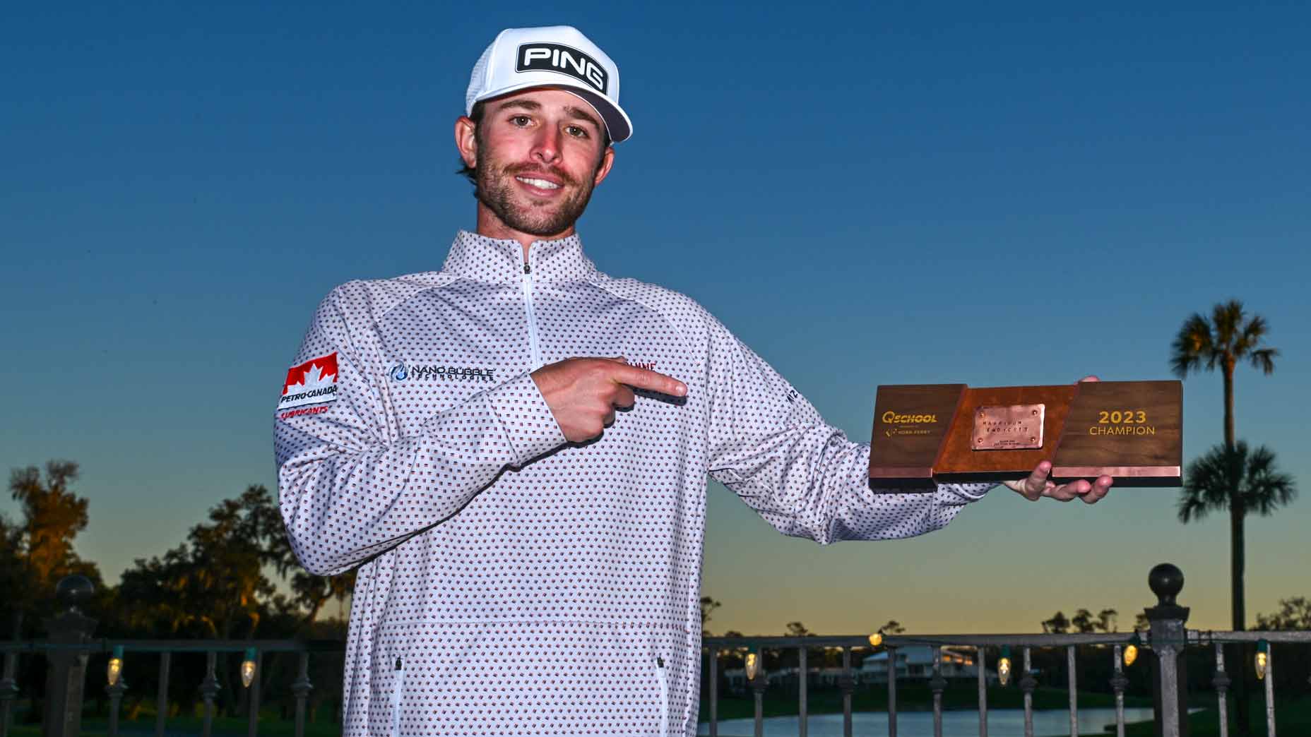 Harrison Endycott holds trophy after winning 2023 Q-School in Florida