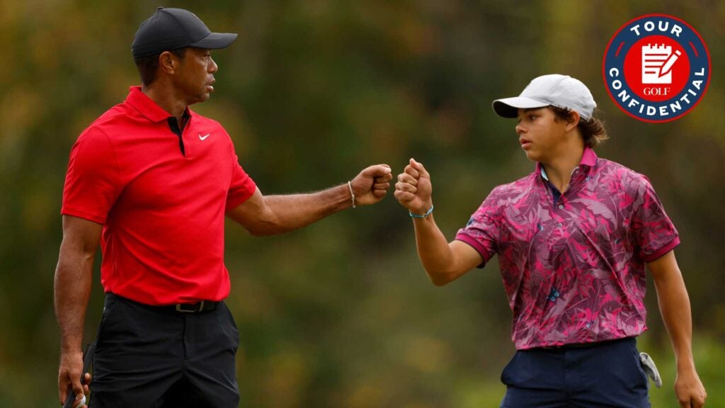Tiger Woods fist bumps Charlie Woods at the PNC Championship.
