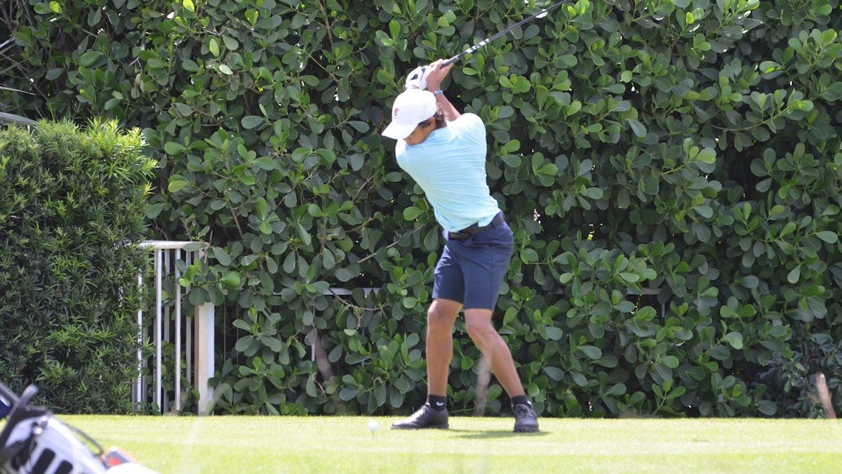 charlie woods playing on the high school golf team at the benjamin school