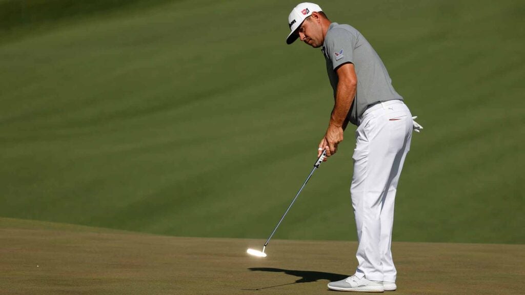 gary woodland hits putt during the masters