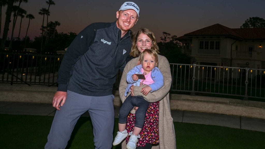 Hadyen Springer celebrates with his wife, Emma, and daughter Annie after earning his PGA Tour card