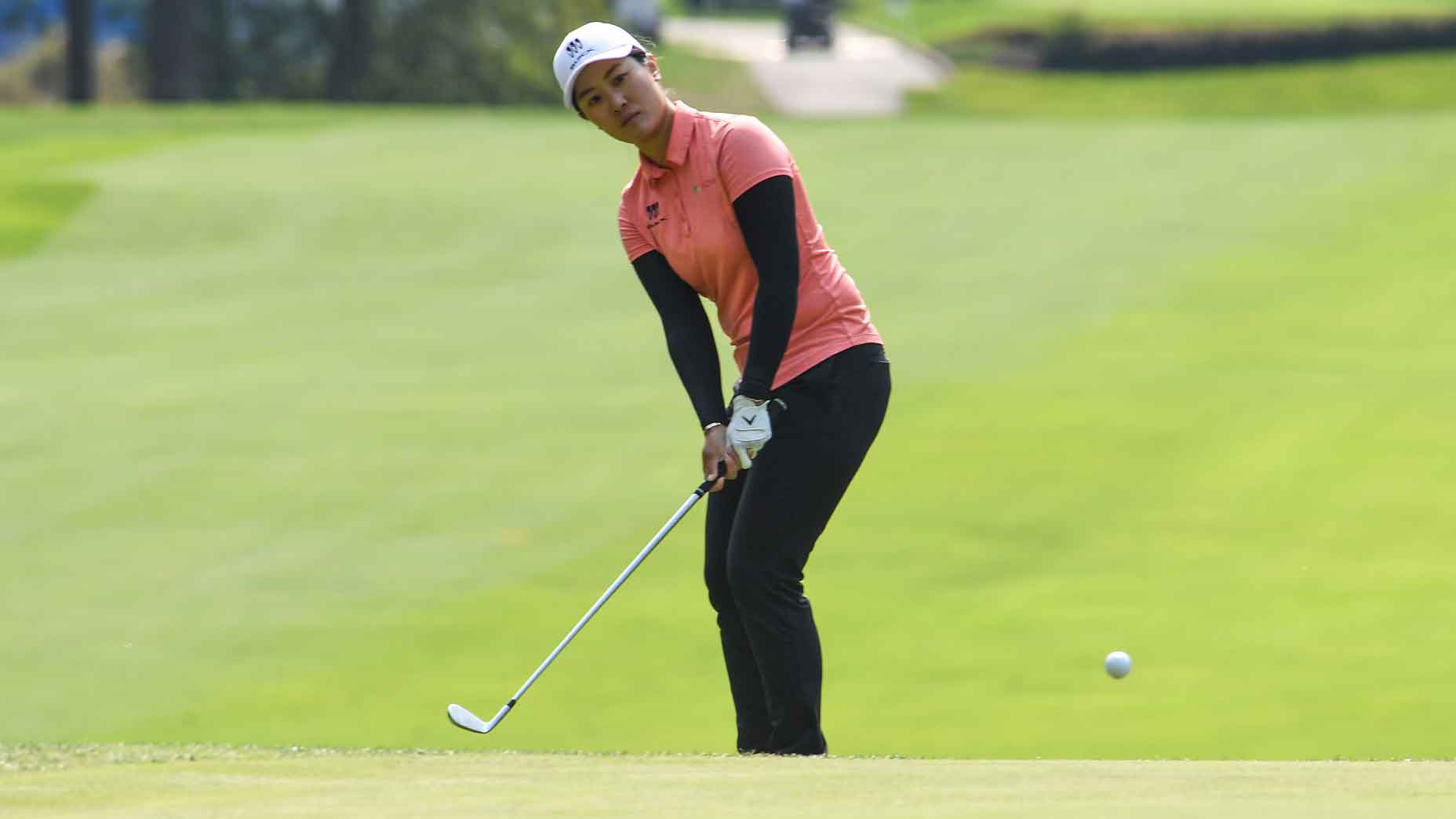 Ruoning Yin of China chips on the 11th green during the first round of the CPKC Women's Open at Shaughnessy Golf and Country Club on August 24, 2023 in Vancouver, British Columbia.