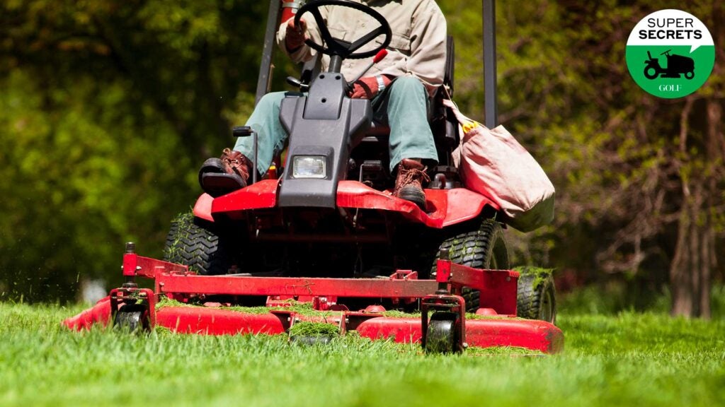 a man rides a lawnmower