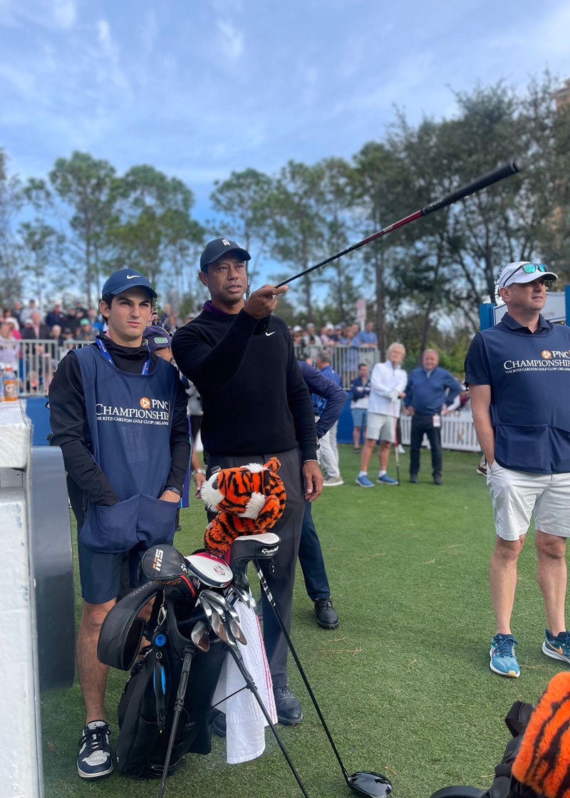 Tiger Woods with Charlie's caddie