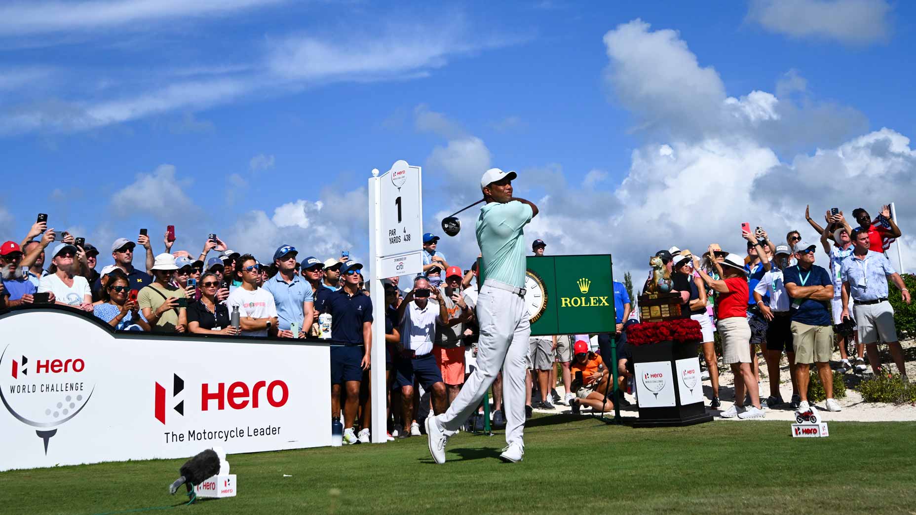Tiger Woods hits drive at 2023 Hero World Challenge in the Bahamas