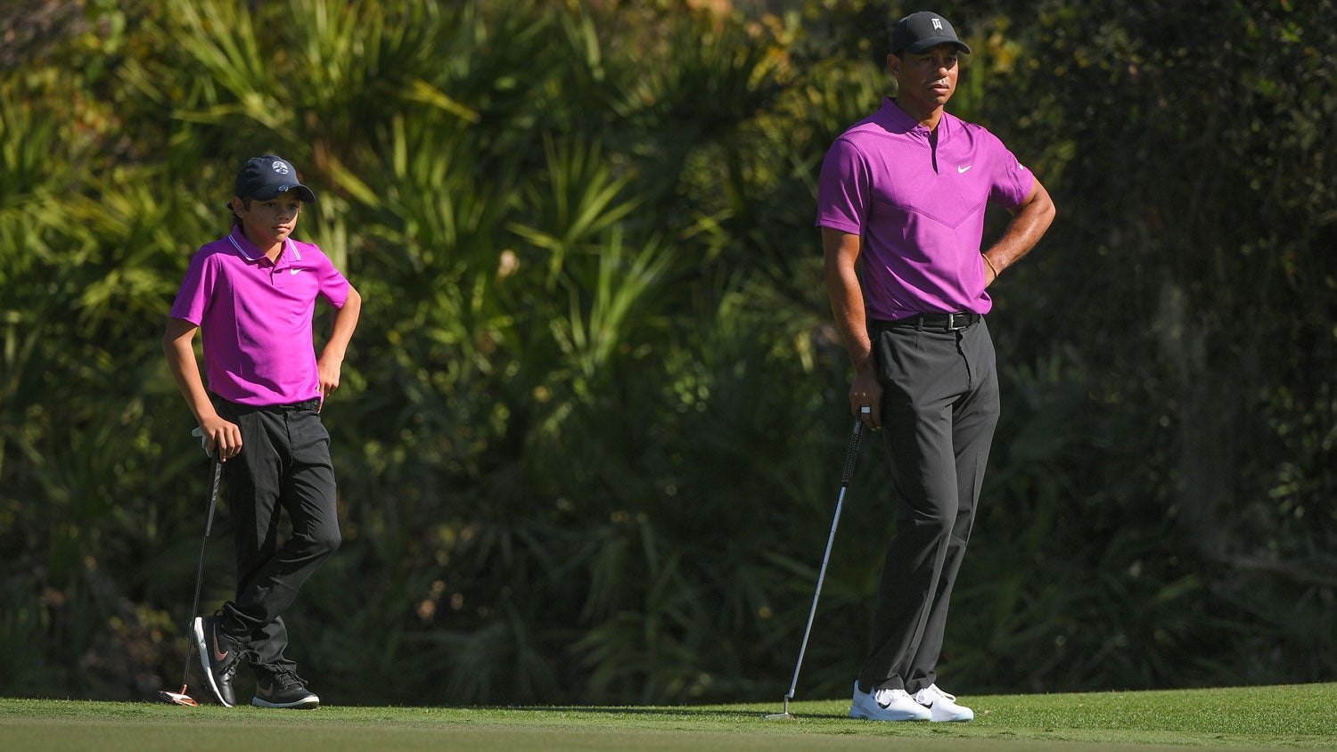 tiger woods and charlie woods standing on tee box at 2020 pnc championship