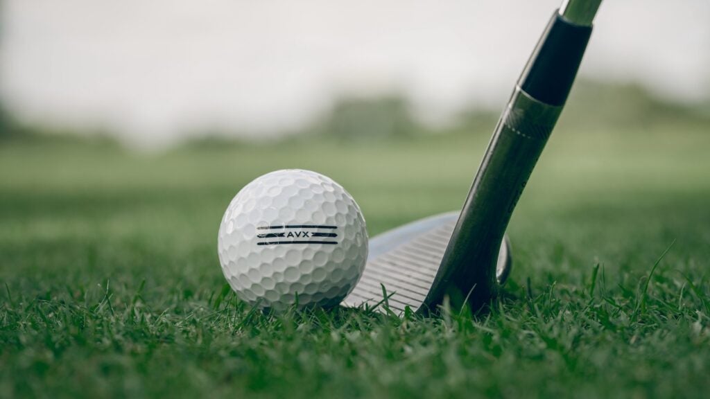 Golf wedge addresses titleist 2024 avx golf ball on golf course