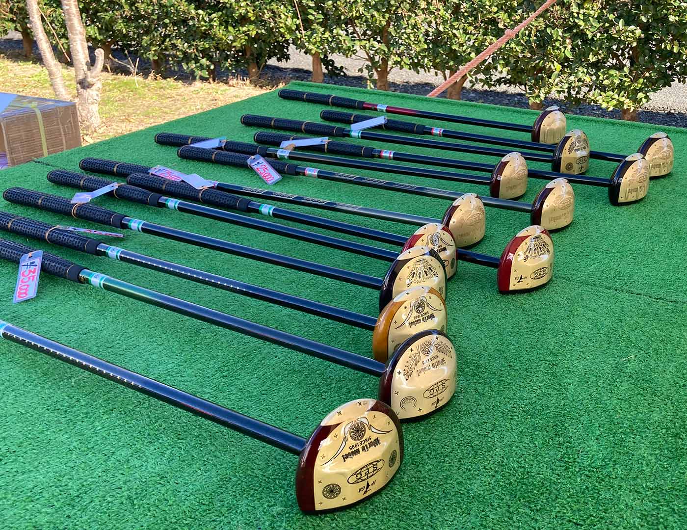 the clubs used at the A golfer tees off at the All-Japan Park Golf Championship