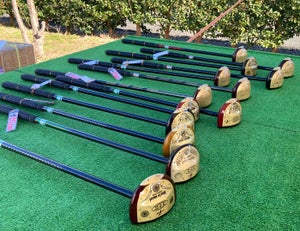the clubs used at the A golfer tees off at the All-Japan Park Golf Championship