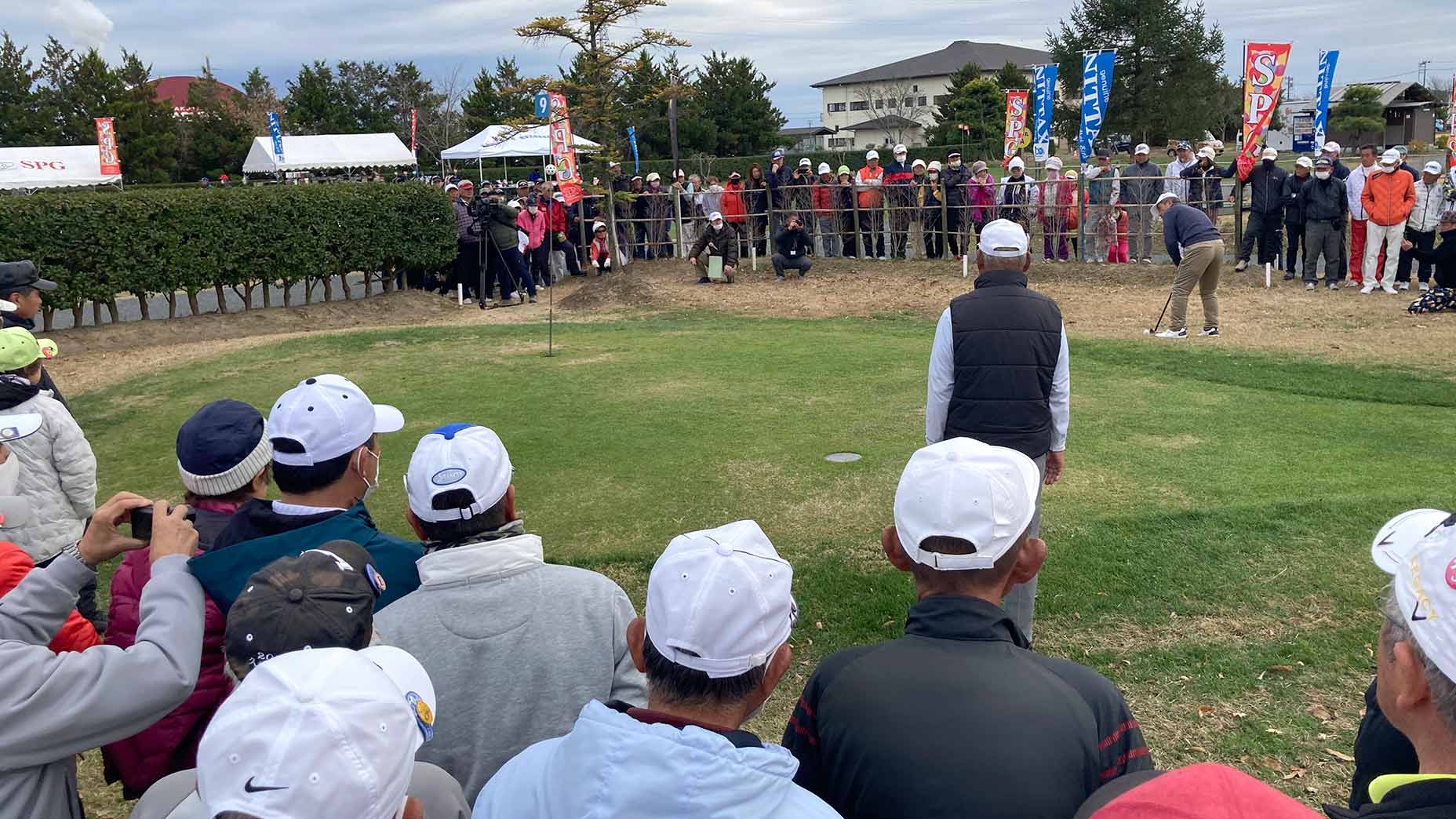 A golfer putts at the All-Japan Park Golf Championship