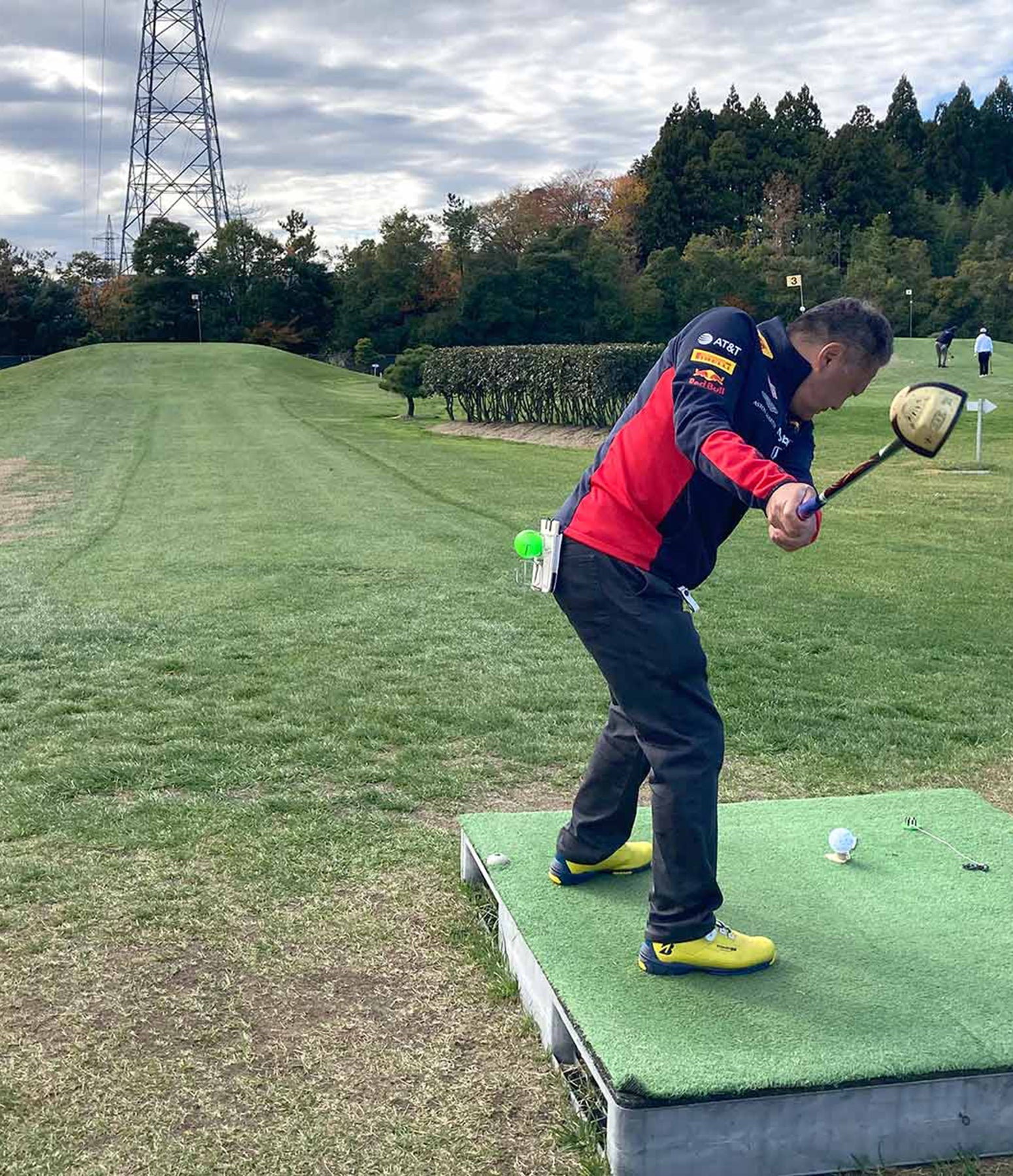 A golfer tees off at the All-Japan Park Golf Championship