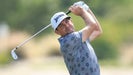 Keegan Bradley hits iron shot during 2023 Hero World Challenge in the Bahamas