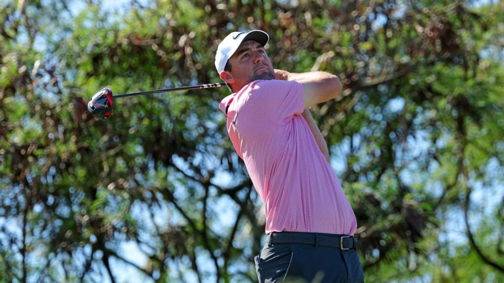 Scottie Scheffler hits drive during PGA Tour's 2024 Sentry