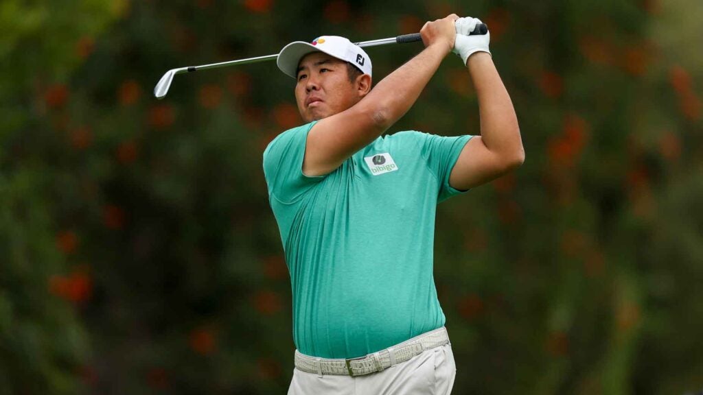 Byeong-Hun An of South Korea tees off the third hole during the third round of The Genesis Invitational at Riviera Country Club on February 17, 2024 in Pacific Palisades, California.
