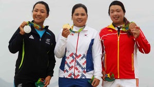 Silver medalist, Lydia Ko of New Zealand, gold medalist, Inbee Park of Korea and bronze medalist Shanshan Feng of China pose on the podium during the medal ceremony for Women's Golf on Day 15 of the Rio 2016 Olympic Games at the Olympic Golf Course on August 20, 2016 in Rio de Janeiro, Brazil.
