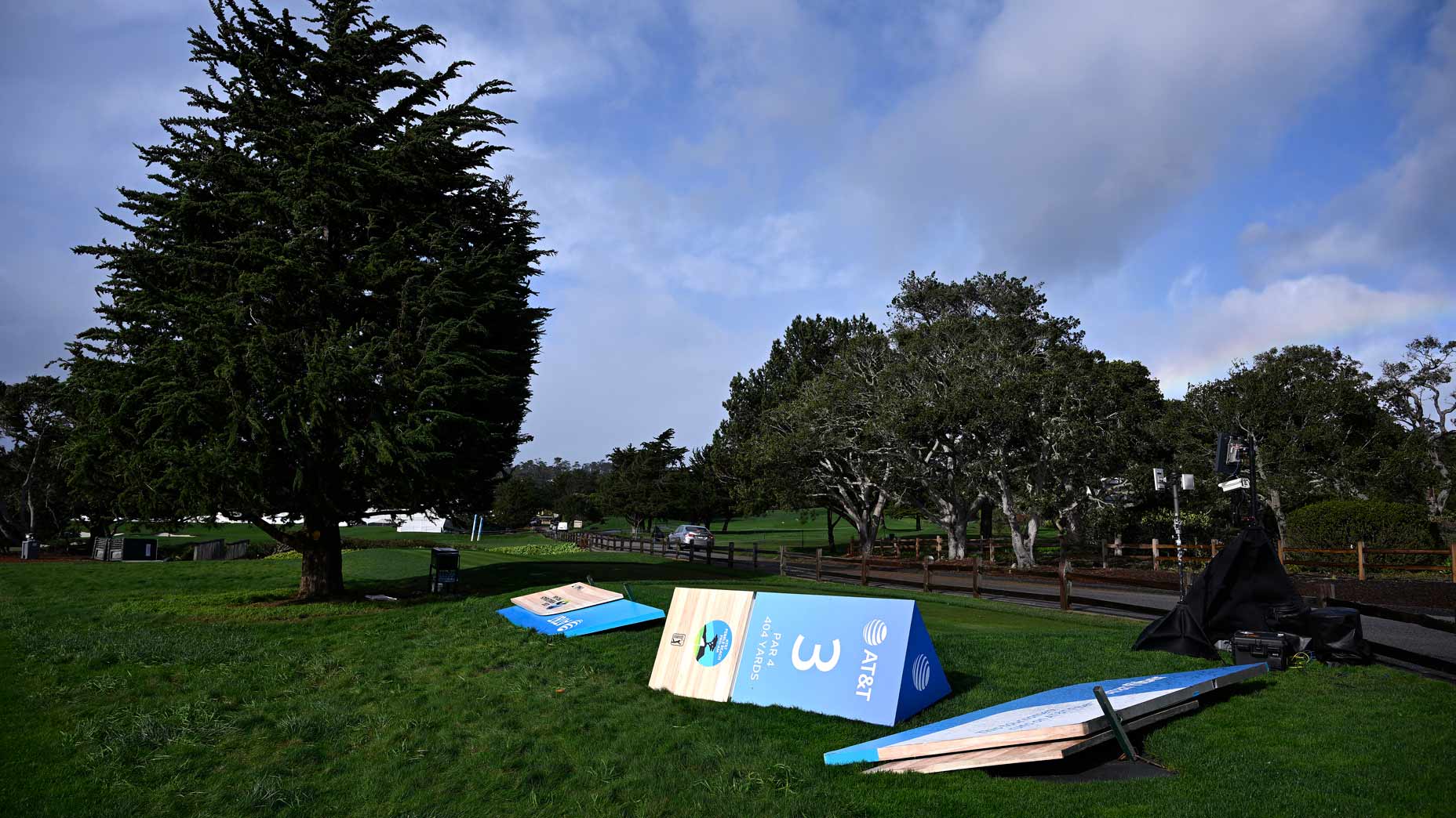 Signs toppled by wind at Pebble Beach.