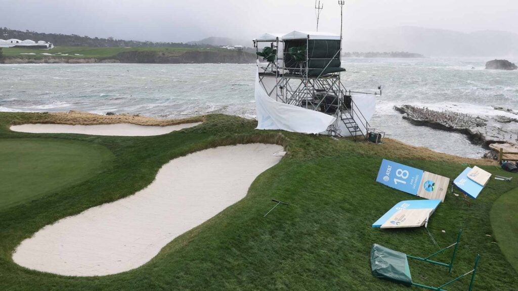 High winds blow against television towers and course signage during the delayed final round start the AT&T Pebble Beach Pro-Am at Pebble Beach Golf Links on February 04, 2024 in Pebble Beach, California. Sunday's final round was postponed due to inclement weather.