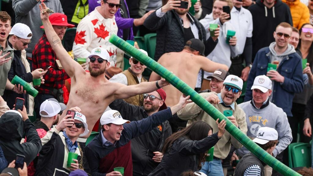 Fans make a beer snake at the WM Phoenix Open.