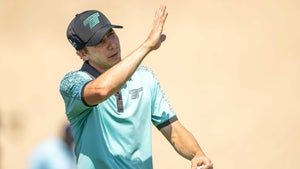 Liv golfer Carlos Ortiz gestures with his hand at 2024 International Series Oman