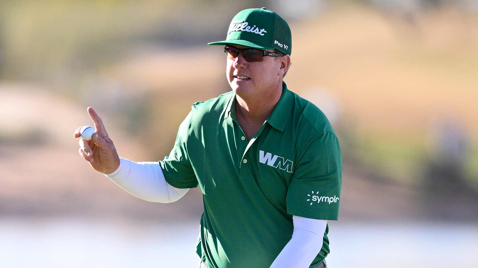 PGA TOur pro Charley Hoffman waves to fans on green at 2024 WM Phoenix Open