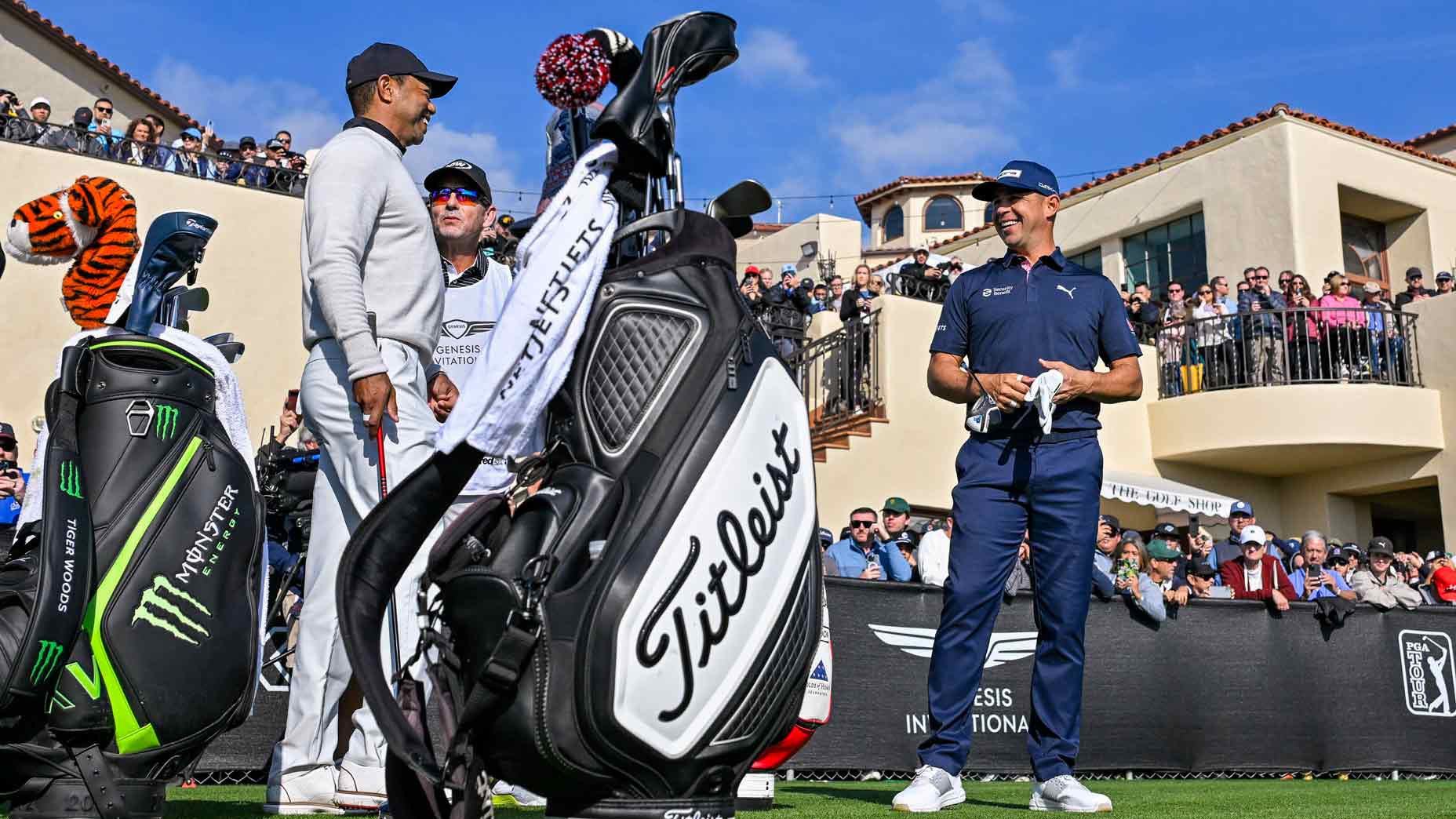 gary woodland and tiger woods talk on the tee box during the opening round of the 2024 genesis invitational