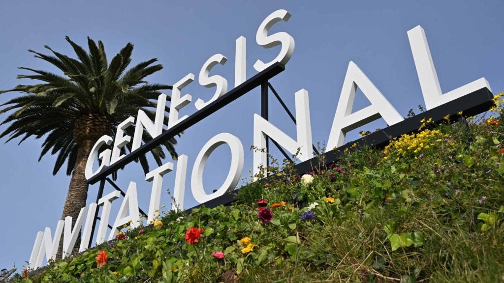 A 2024 Genesis Invitational sign among flowers at Riviera