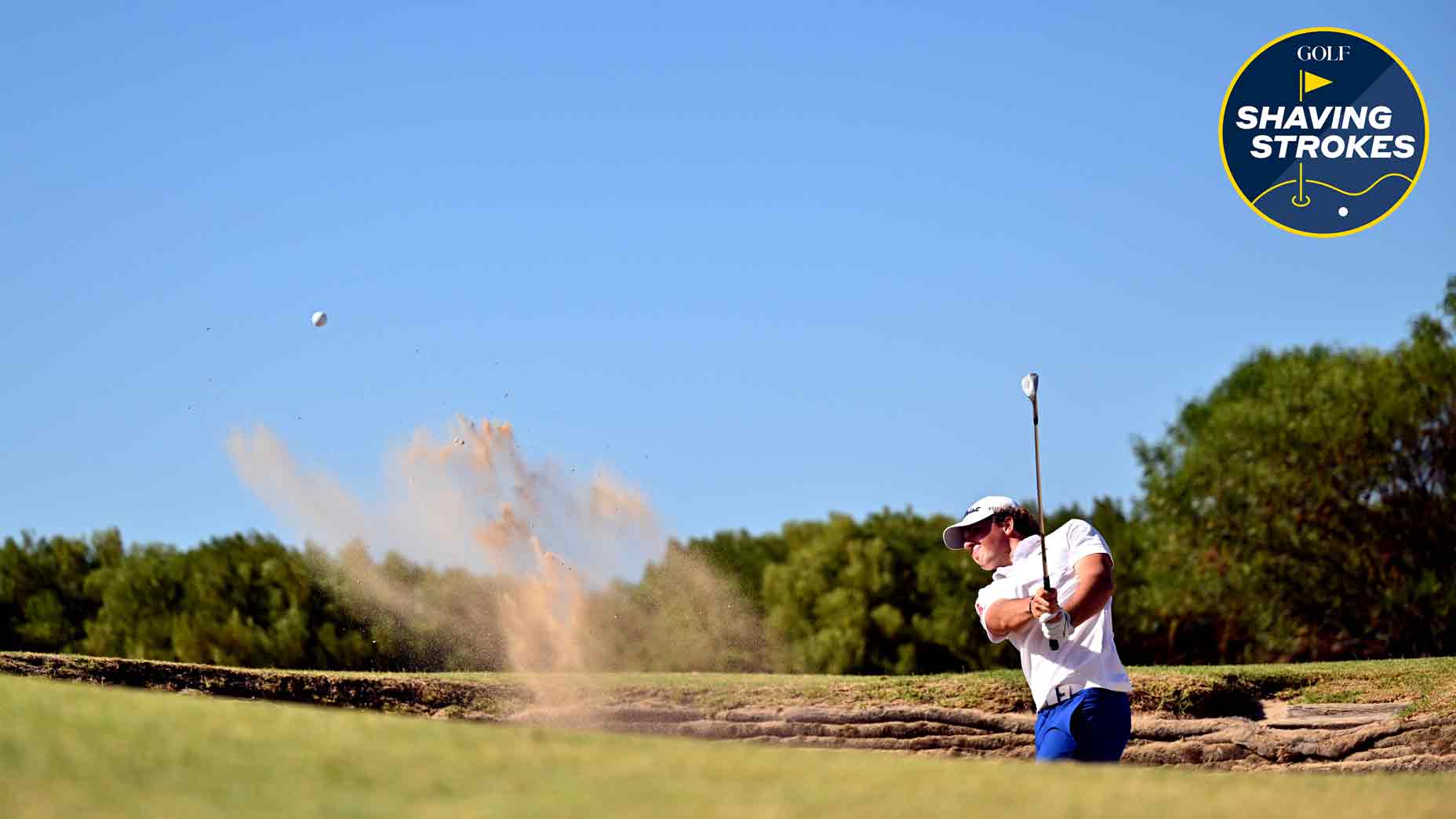 Tricky bunker shot with the ball above your feet? GOLF Top 100 Teacher Josh Zander explains 3 adjustments to make for instant success