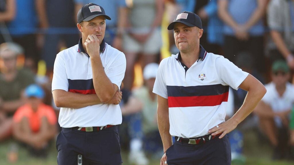 Jordan Spieth and Justin Thomas talk during a match at the 2023 Ryder Cup