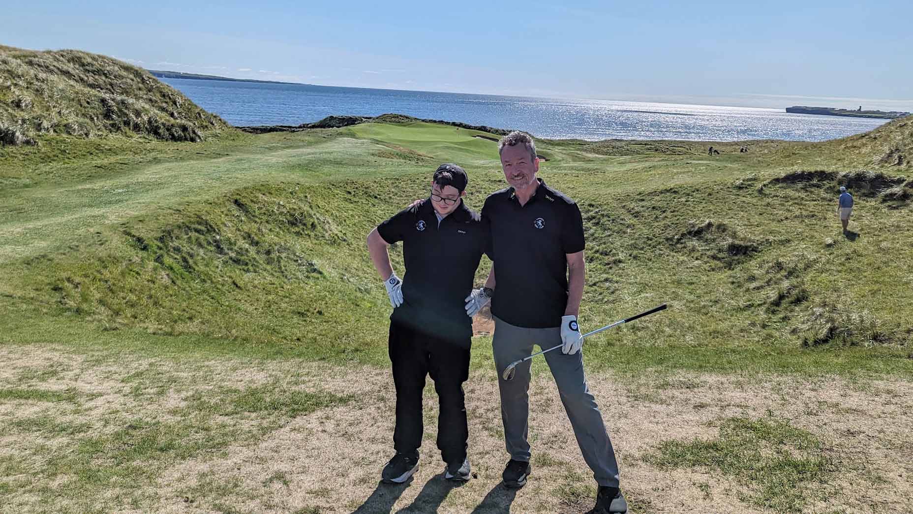 Michael Bérubé and his son, Jamie, at Lahinch.