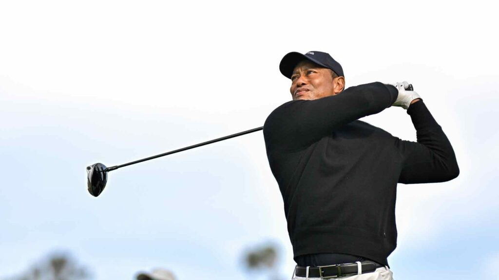 tiger woods swings driver during the 2024 genesis invitational pro-am