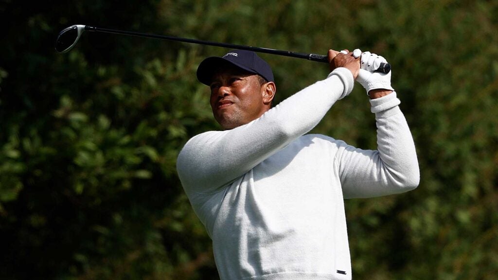 Tiger Woods watches a drive Thursday at the 2024 Genesis Invitational