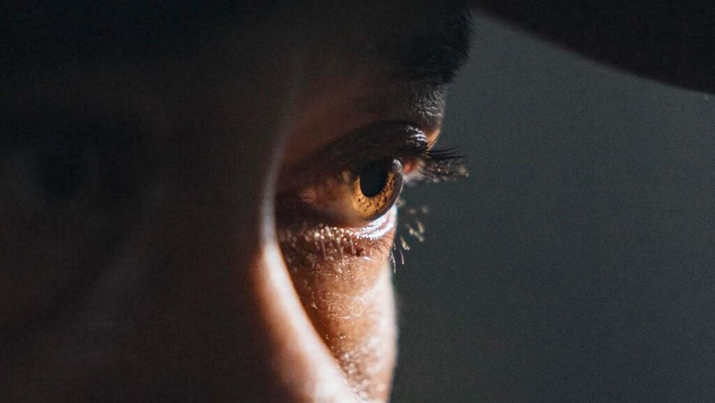 Close-up photo of Tiger Woods' eye posted on X