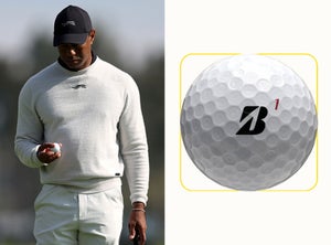Tiger Woods holding the newest iteration of the Bridgestone Tour B X Golf Balls which he is debuting at the Genesis Invitational.