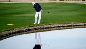 Gary Woodland plays his shot on the 15th hole during the first round of the Waste Management Phoenix Open at TPC Scottsdale