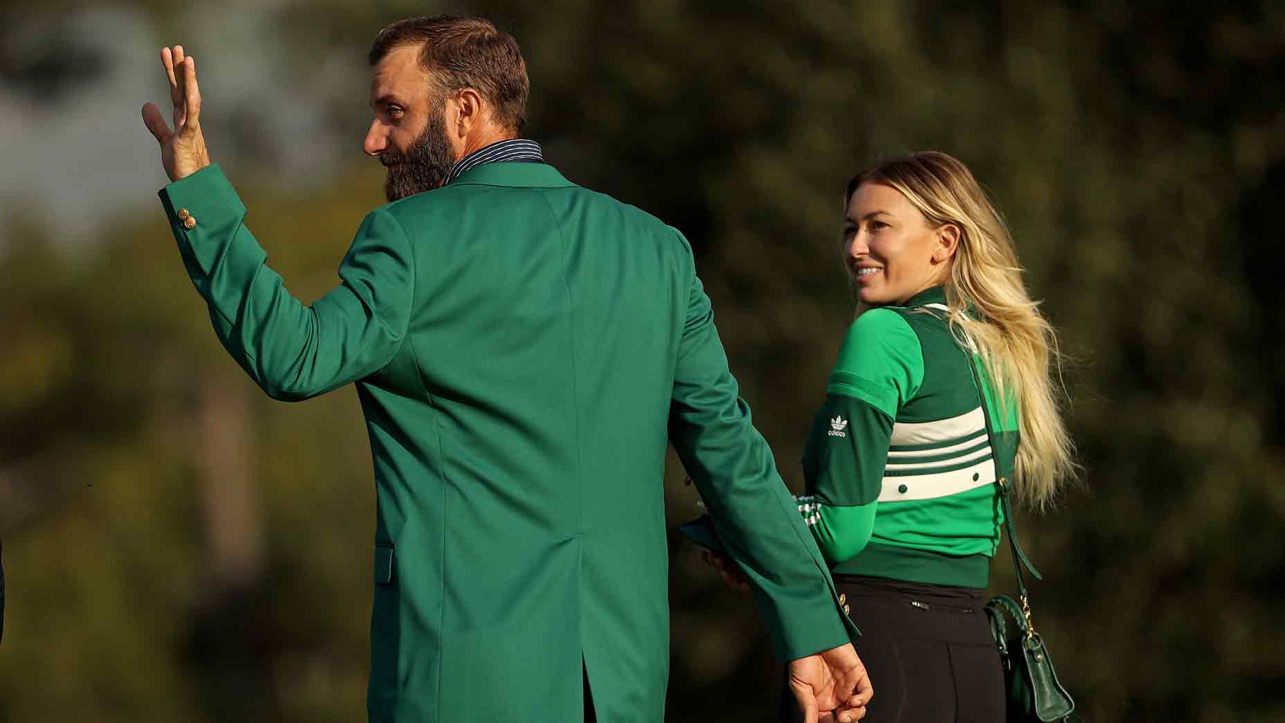 Dustin Johnson of the United States celebrates with fiancée Paulina Gretzky during the Green Jacket Ceremony after winning the Masters at Augusta National Golf Club on November 15, 2020 in Augusta, Georgia.