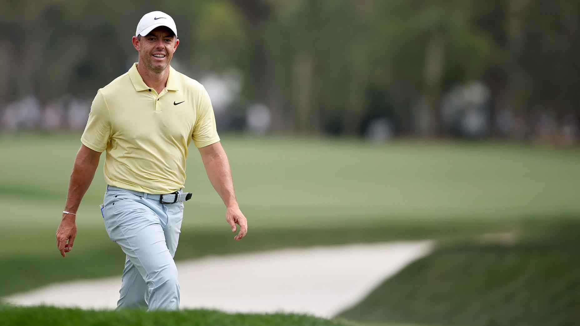 Rory McIlroy of Northern Ireland walks to the ninth green during the third round of THE PLAYERS Championship at TPC Sawgrass on March 16, 2024 in Ponte Vedra Beach, Florida.