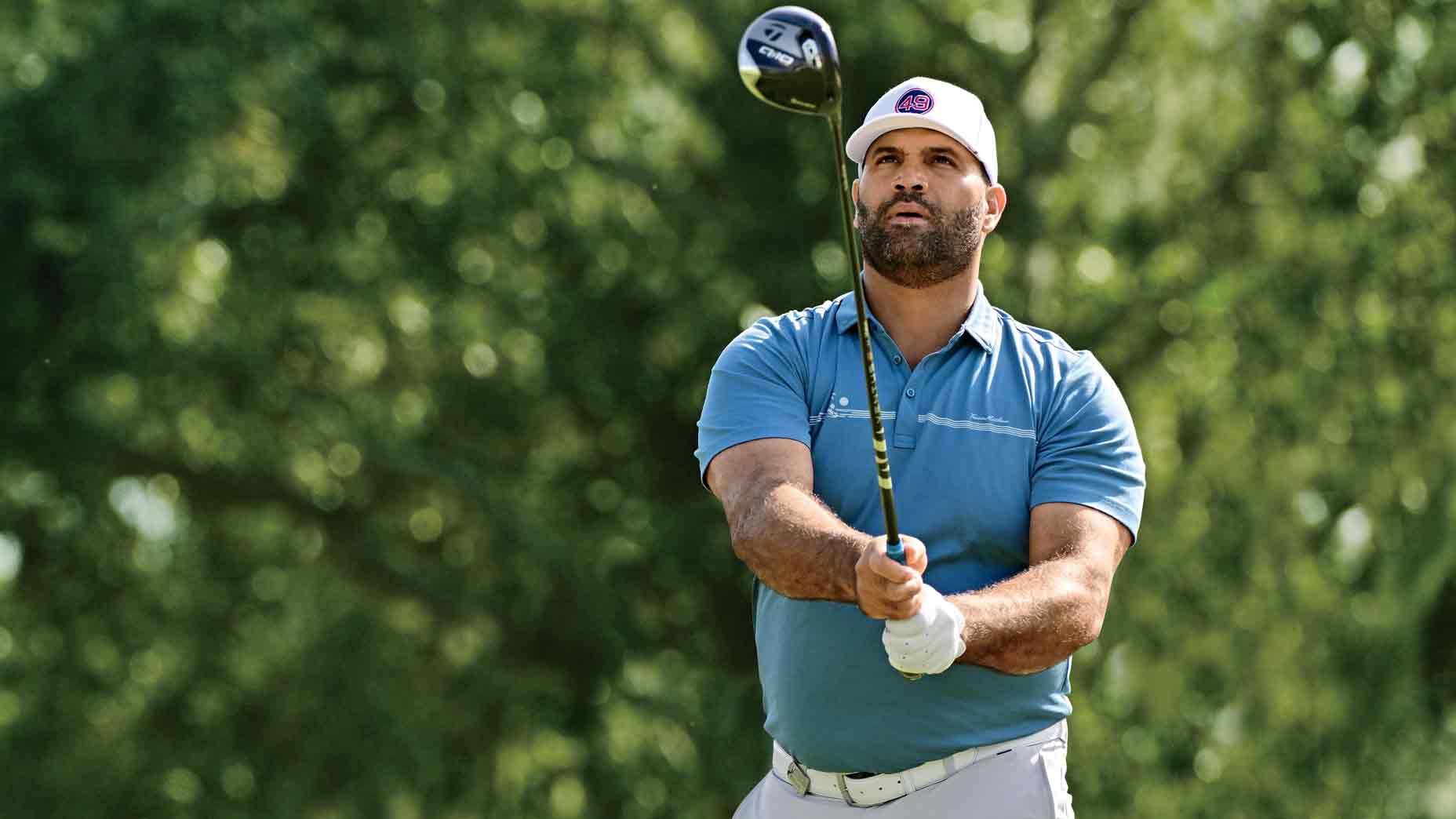 Retired professional baseball player Albert Pujols plays his shot from the ninth tee during the first round of the Hilton Grand Vacations Tournament of Champions at Lake Nona Golf & Country Club on January 18, 2024 in Orlando, Florida