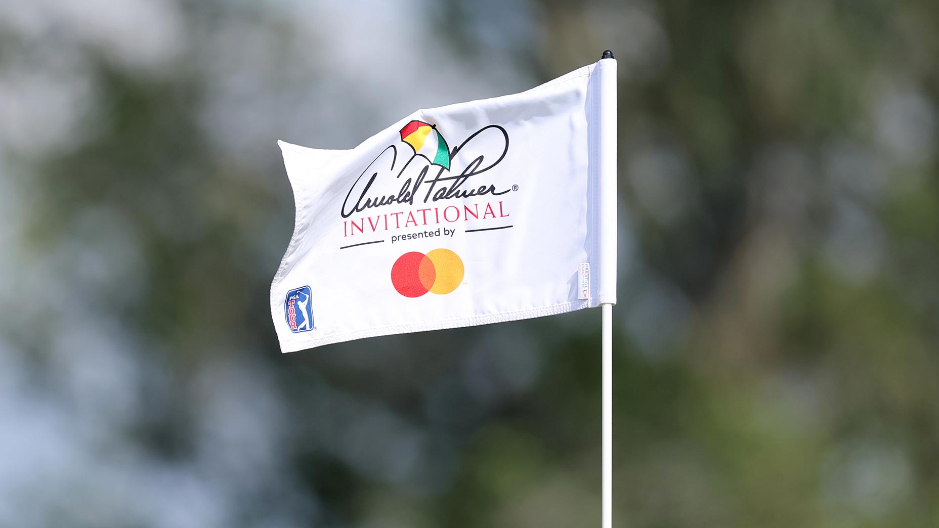 Pin flag flapping in wind at 2024 Arnold Palmer Invitational at Bay Hill