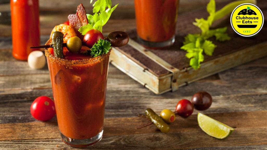 Homemade Bacon Spicy Vodka Bloody Mary with Tomatos, Olive and Celery