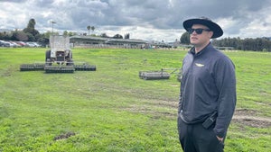 Buchanan Fields co-owner Robett Hollis looks on at the range.