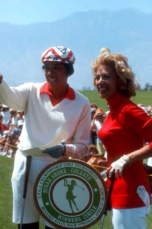 Former American tennis player Althea Gibson (1927-2003) and American singer, actress, and television personality Dinah Shore (1916-1994) look over the course during the Dinah Shore Colgate Winner's Circle on April 16, 1972 at the Mission Hills Country Club in Rancho Mirage, California.