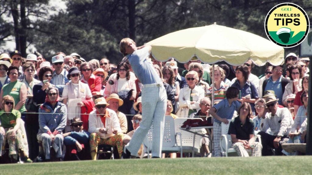 johnny miller hits a tee shot during the masters