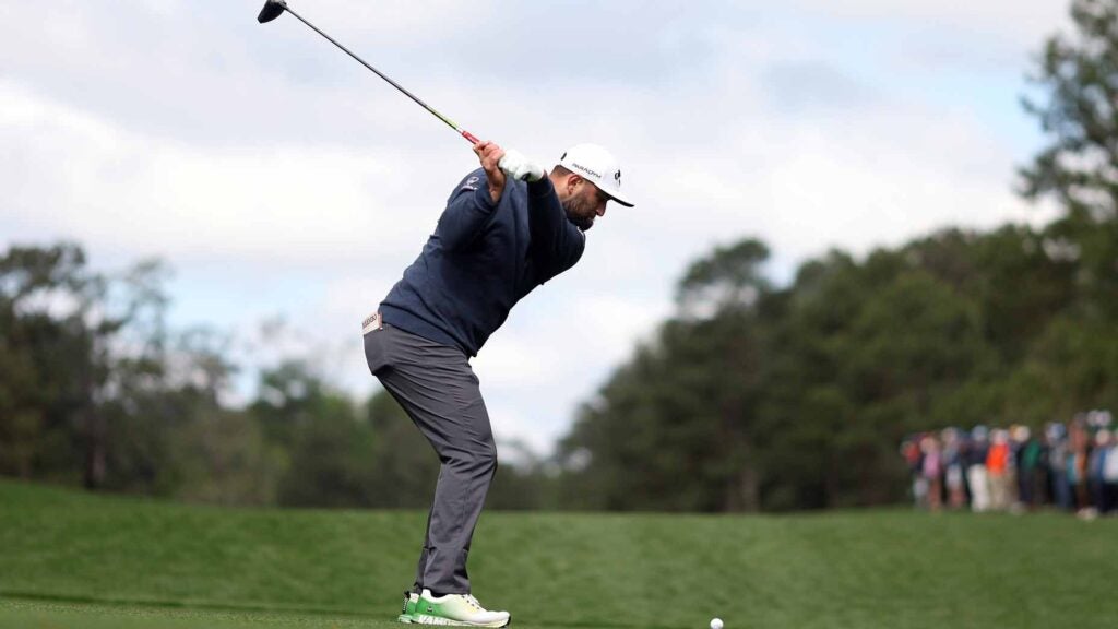 jon rahm swings a driver during round 3 of the 2023 masters