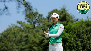 LPGA pro minjee lee aims with a golf club during the 2015 Kingsmill Championship tournament