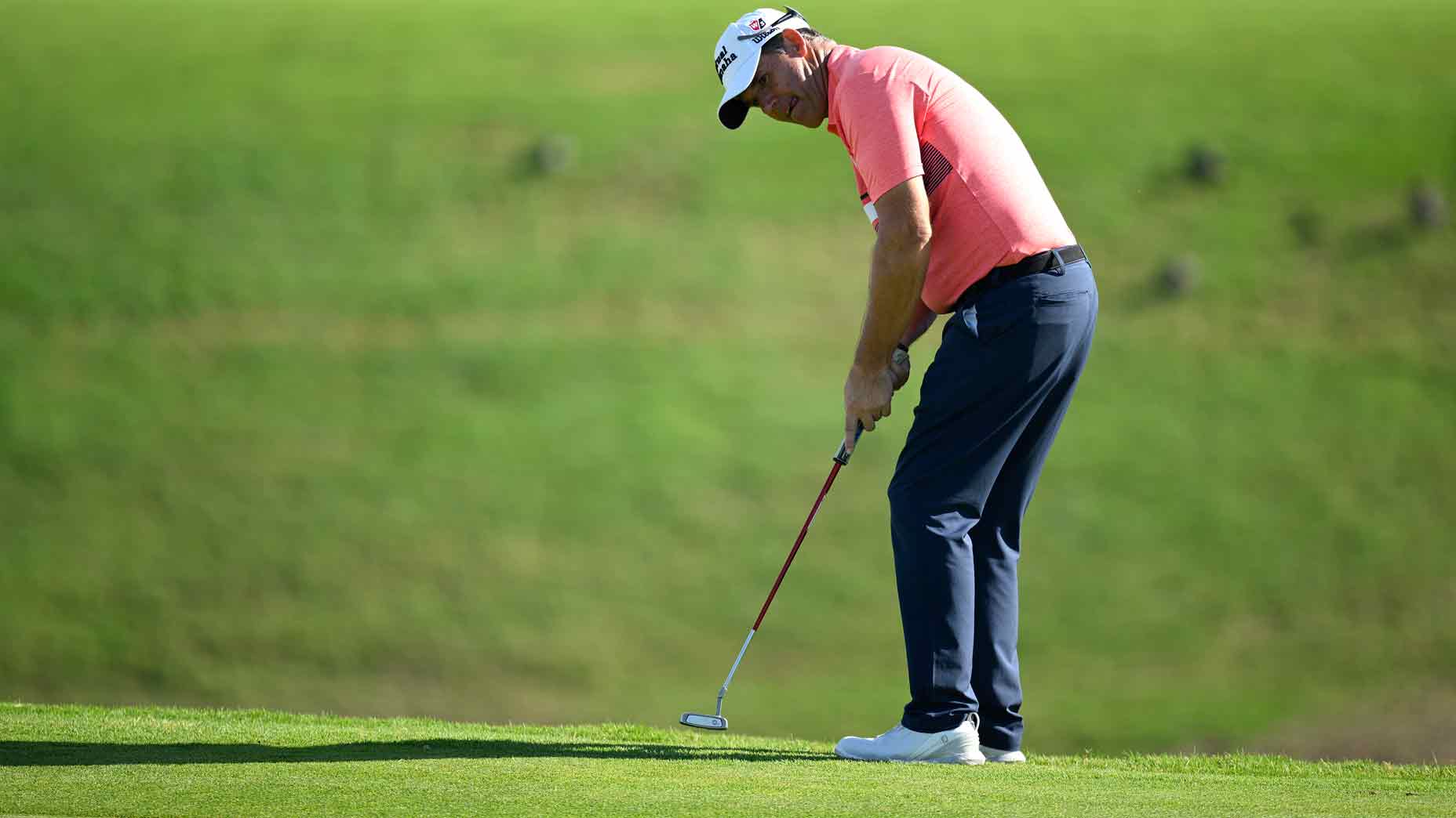 padraig harrington putts during the 2024 mexico open