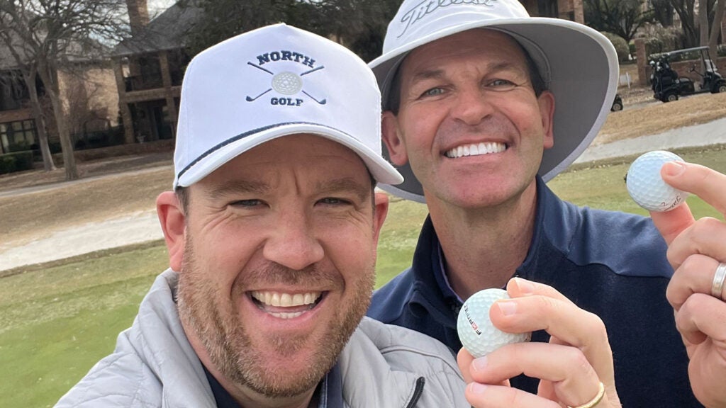 Texas pastors Connor Bales, left, and David Shivers with their hole in one balls