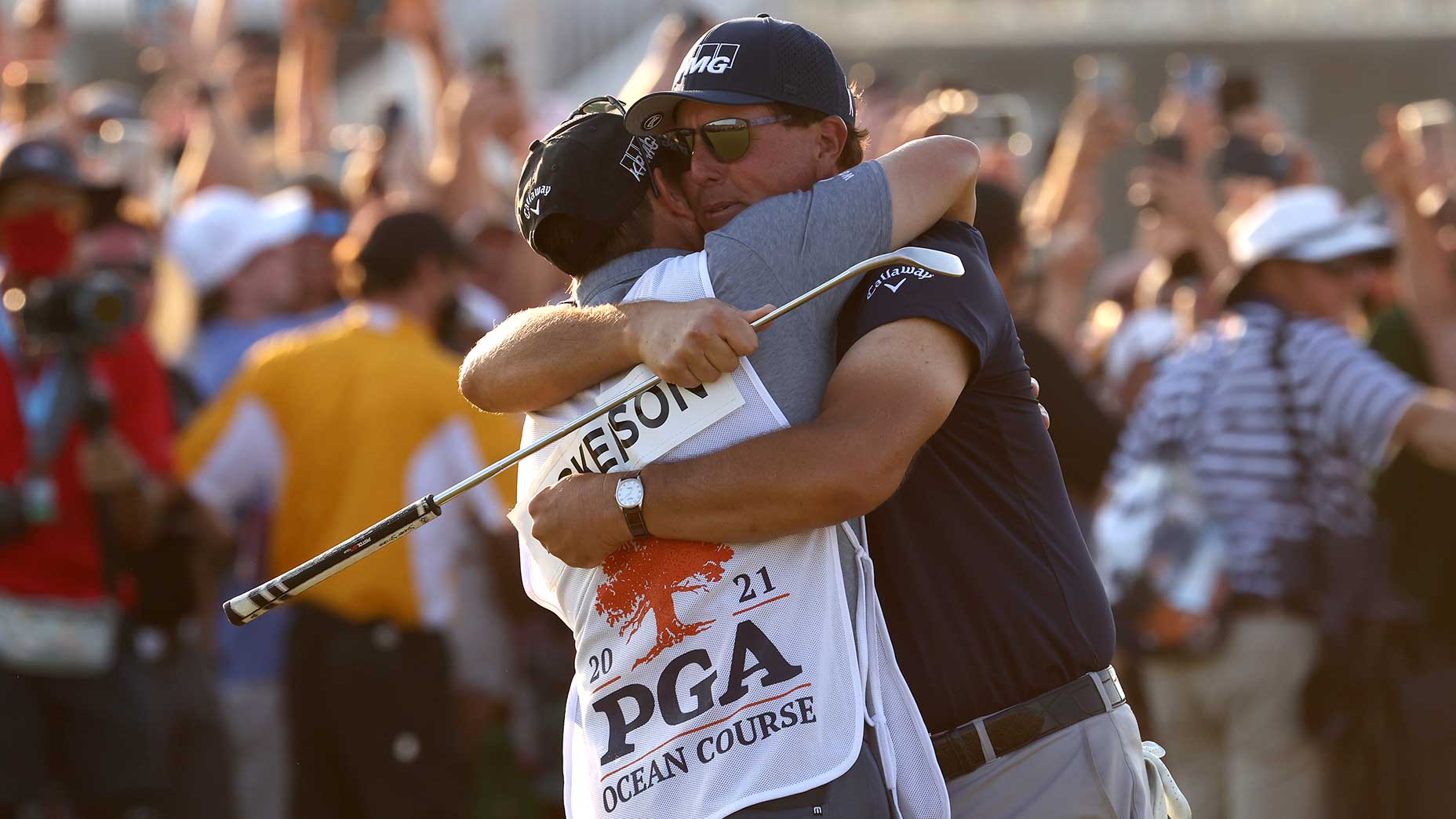 Phil Mickleson and his brother/caddie, Tim Mickelson, celebrate their 2021 PGA Championship victory.