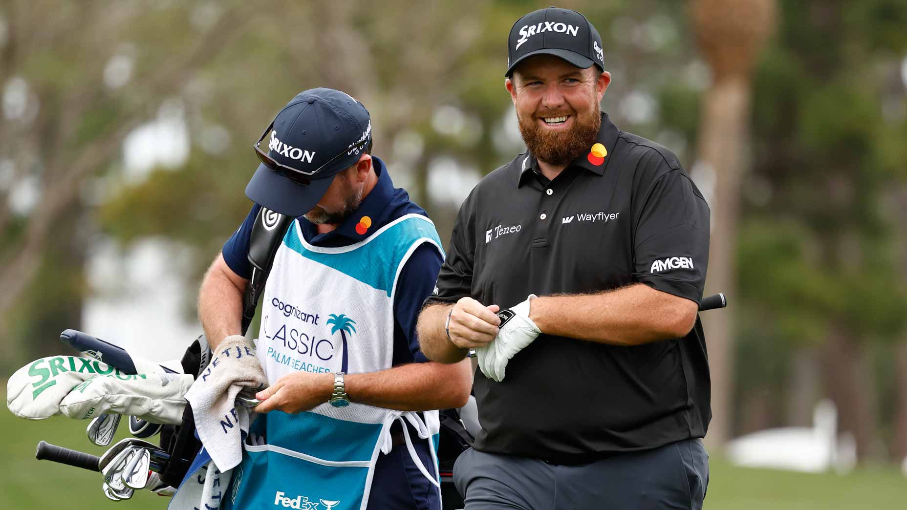 Shane Lowry and caddie walk and talk at 2024 Cognizant Classic