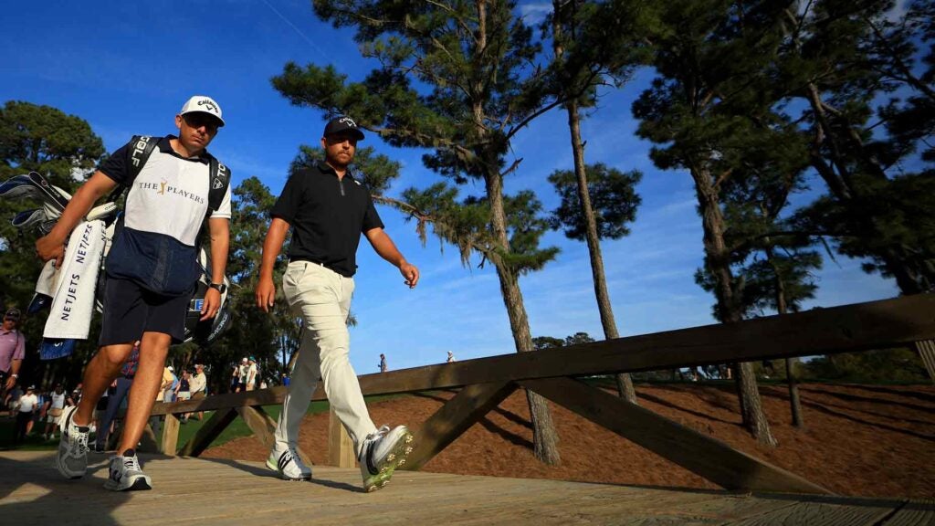 Xander Schauffele of the United States walks to the 16th tee during the third round of THE PLAYERS Championship at TPC Sawgrass on March 16, 2024 in Ponte Vedra Beach, Florida.